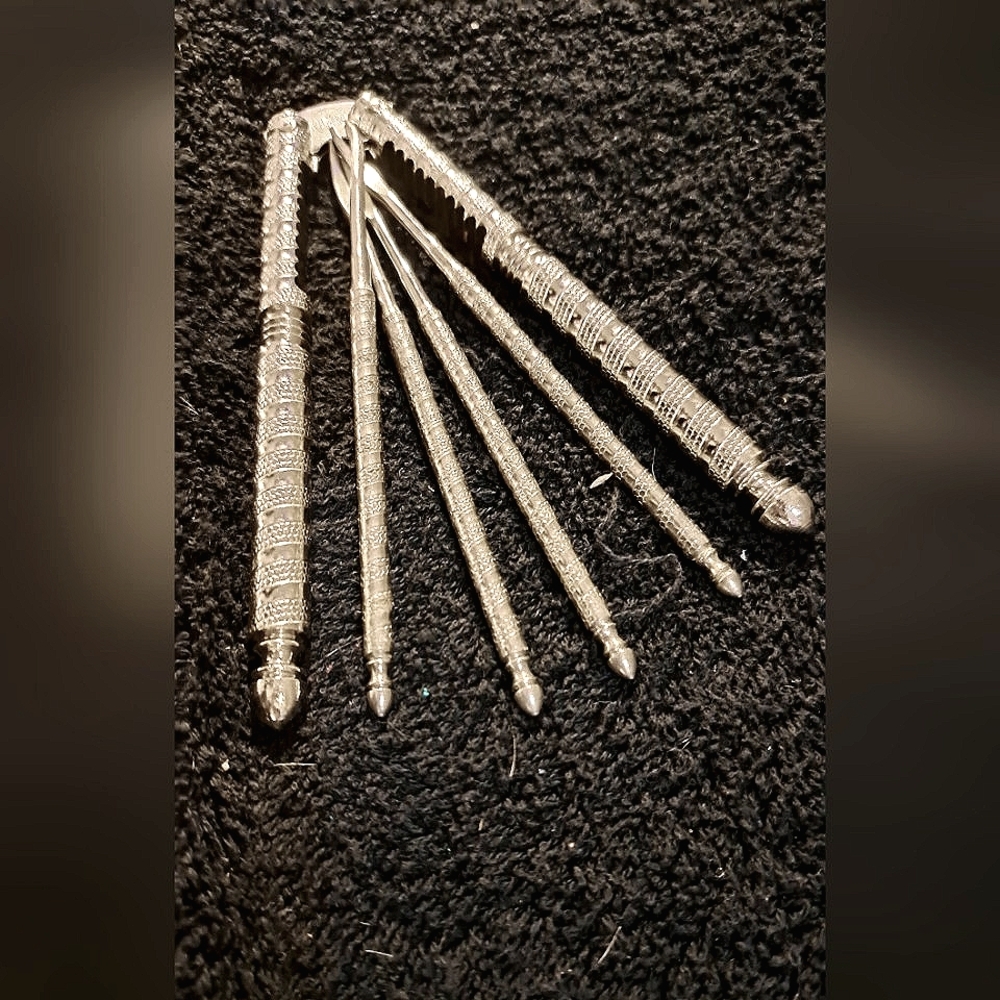 HMQ nut cracker and 4 matching picks